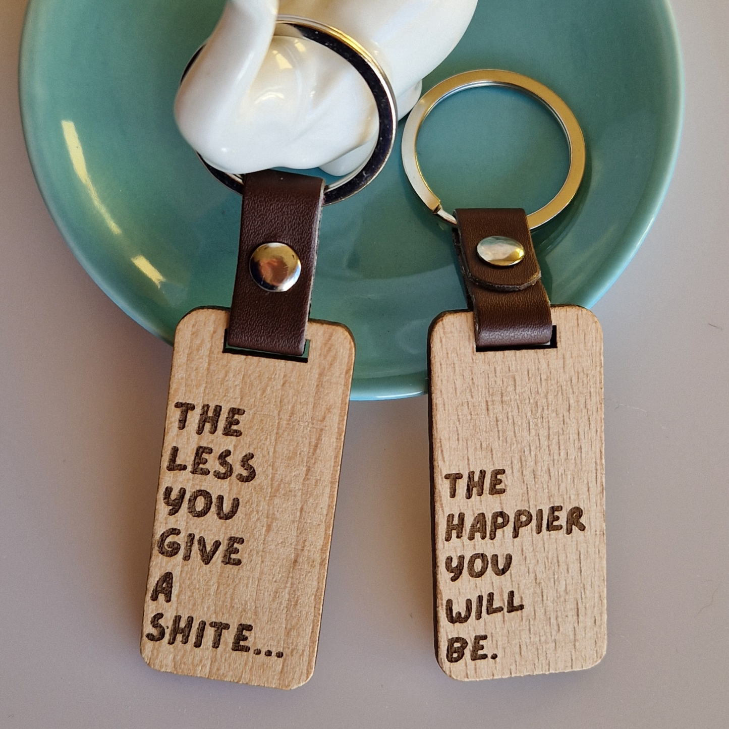THE LESS YOU GIVE A SHITE KEYRING